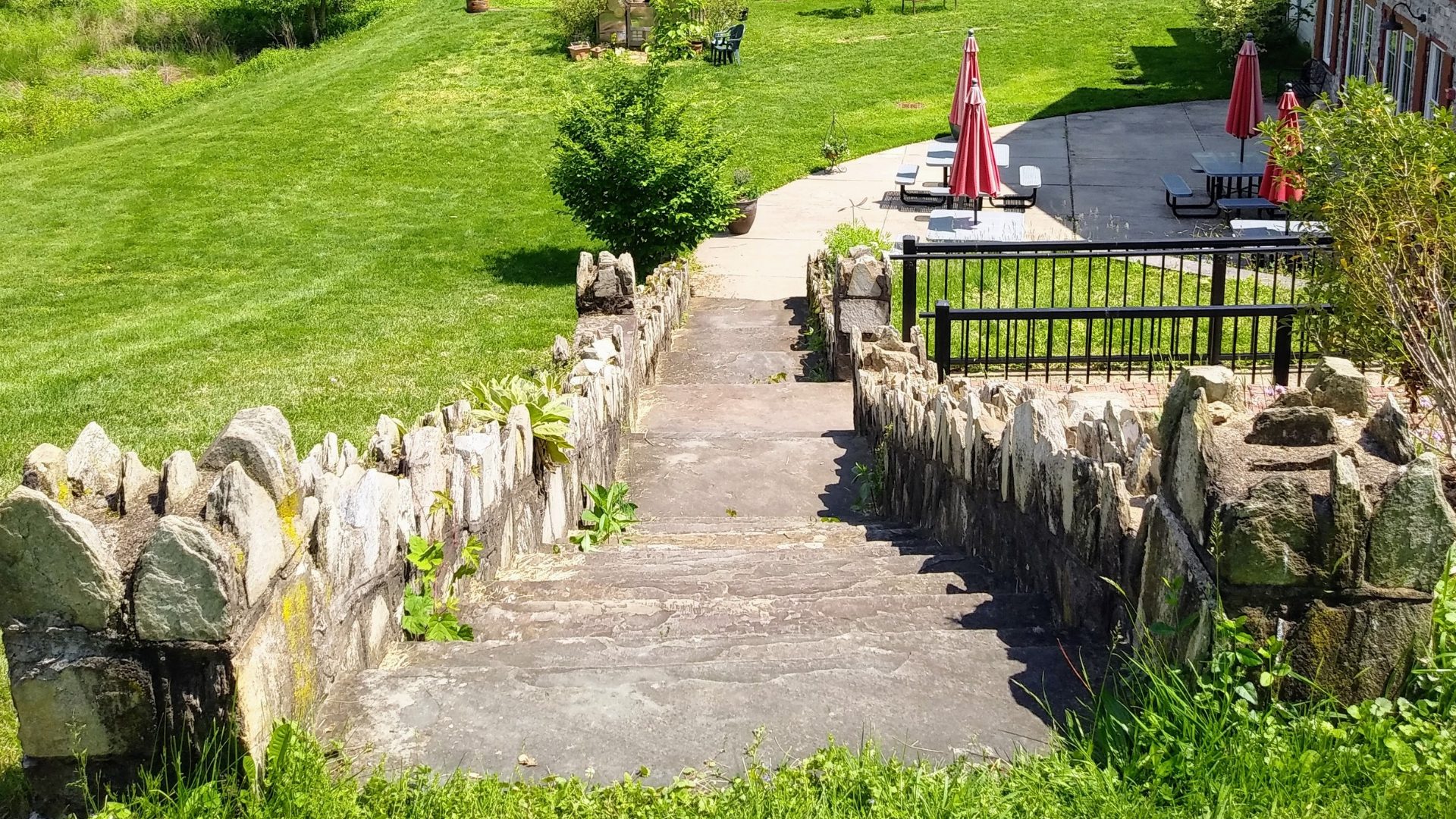 A stone path leading to the top of steps.