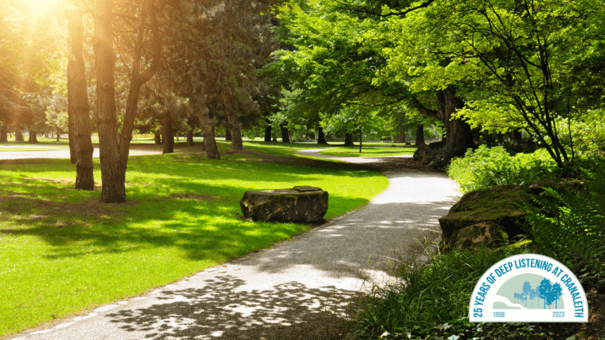 Sunny path through a green park.