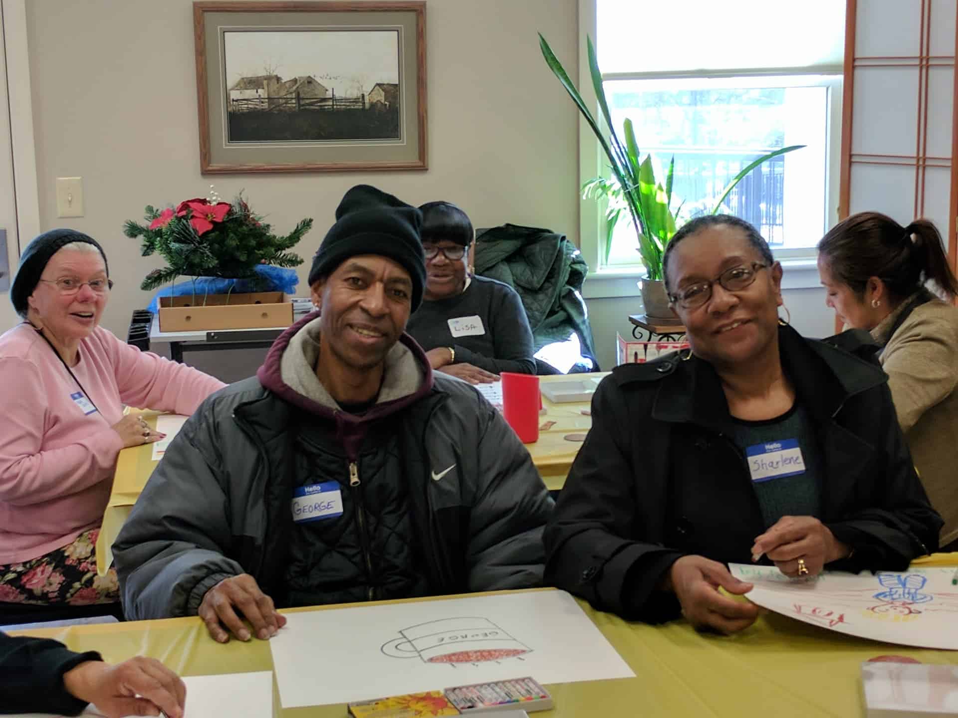 Smiling CATCH participants in the art room.