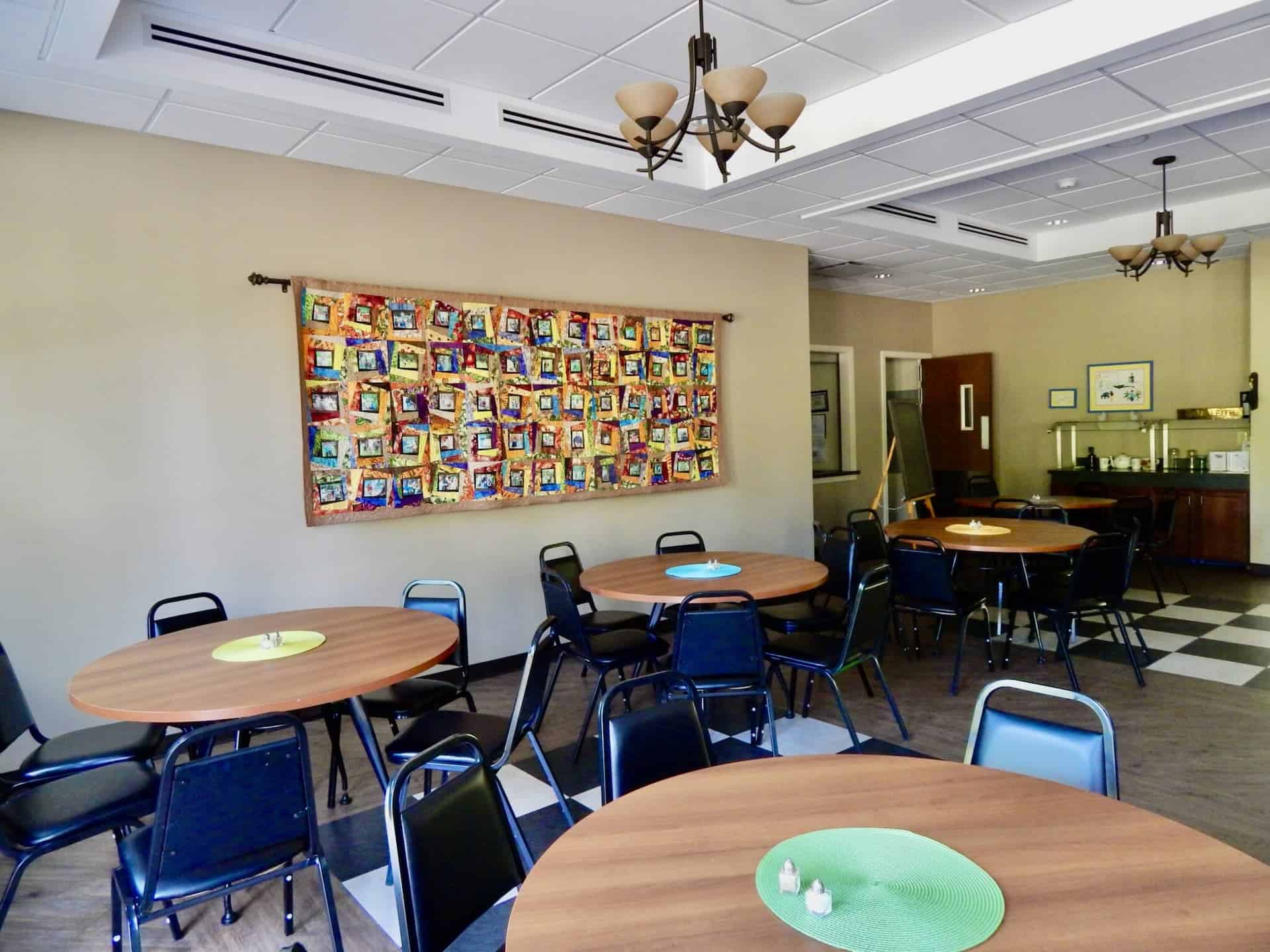 Dining room tables, quilt, and tile.