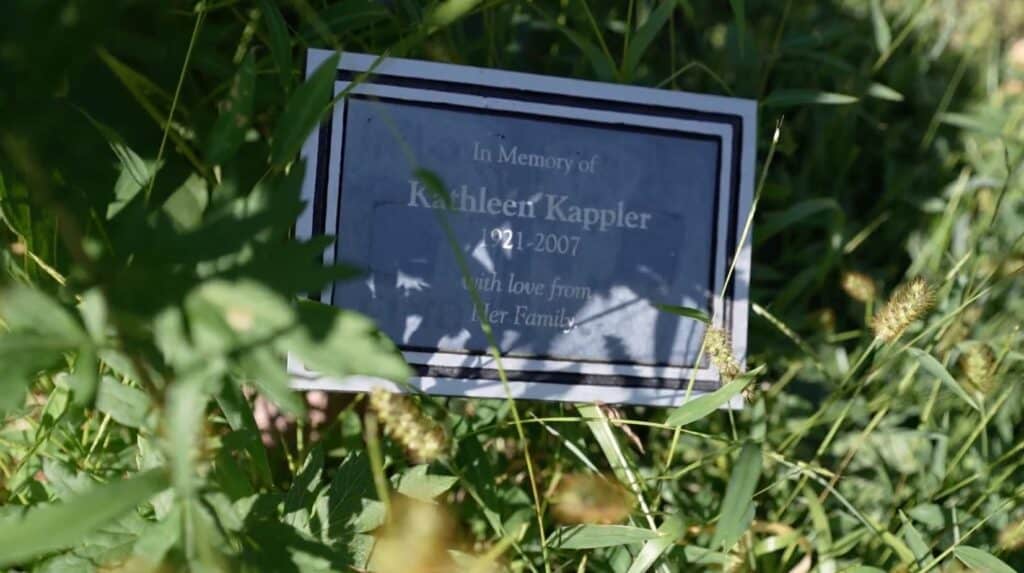 A memorial sign, reading, "In memory of Kathleen Kappler, 1921-2007.