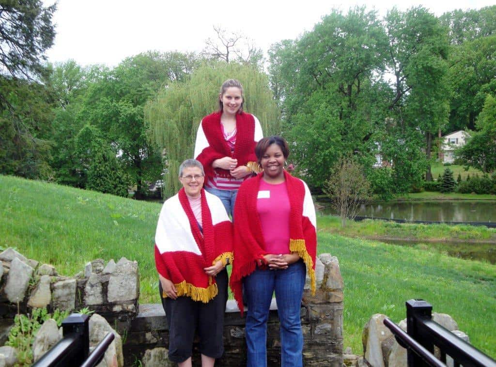 Women's Veterans standing outside at cranaleith on the steps.